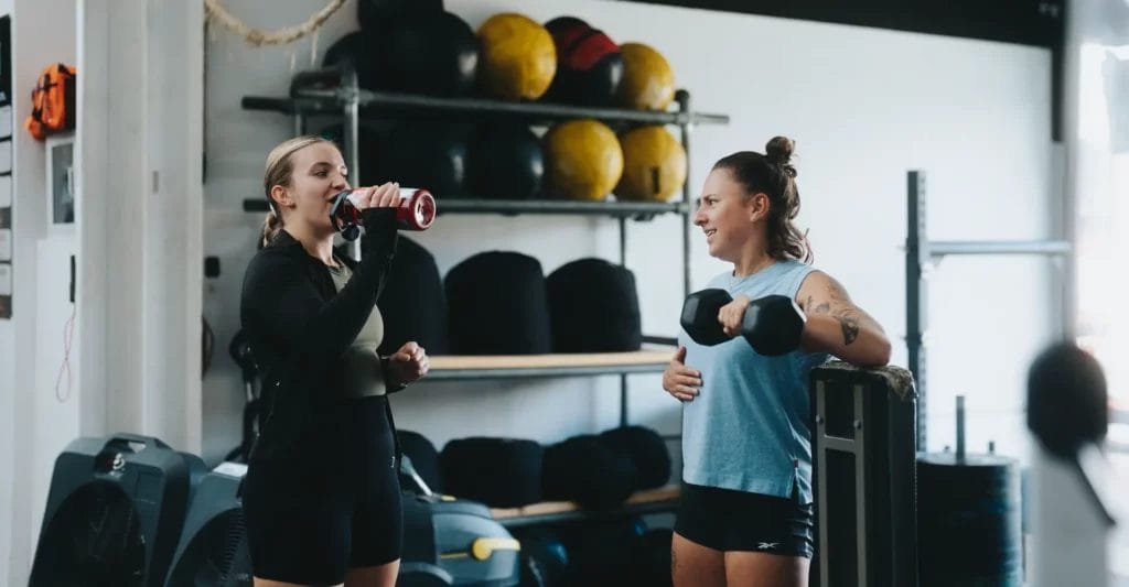 Women talking and working out